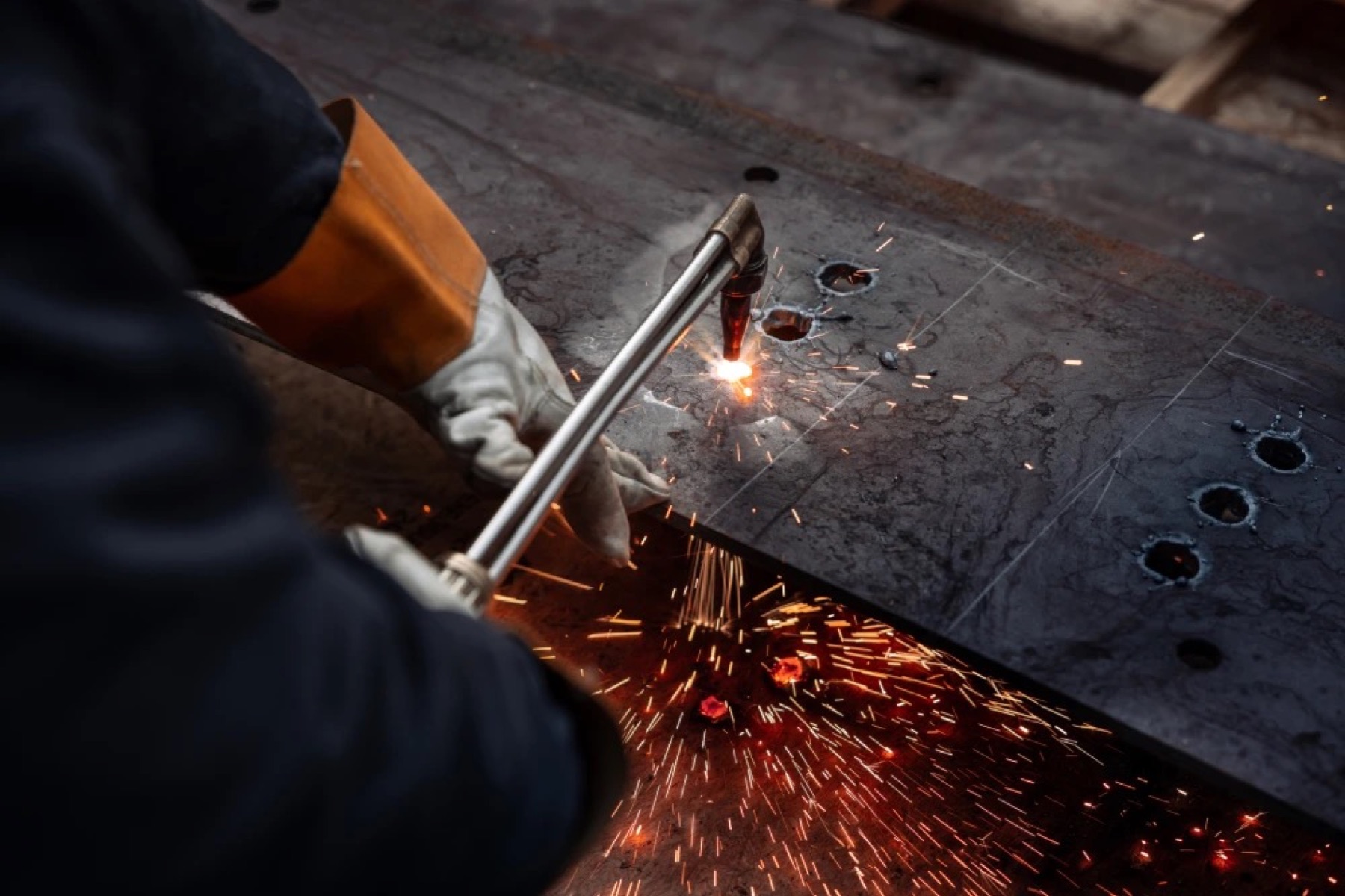 Steel fabrication with sparks in the shop
